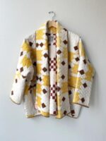 The Parenting 2025 Parker Posey Yellow & White Quilted Coat