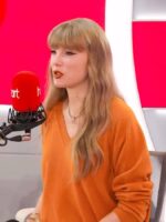Taylor Swift Heart Radio for The Life of a Showgirl Orange Sweater