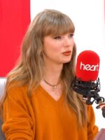 Taylor Swift Heart Radio for The Life of a Showgirl Orange Sweater