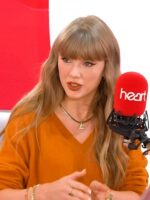 Taylor Swift Heart Radio for The Life of a Showgirl Orange Sweater
